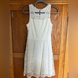Charming Charlie short lace dress. Sleeveless. Size M back keyhole closure